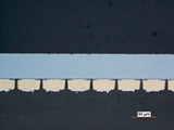 50µm pitch driver IC adhesively bonded with ACF